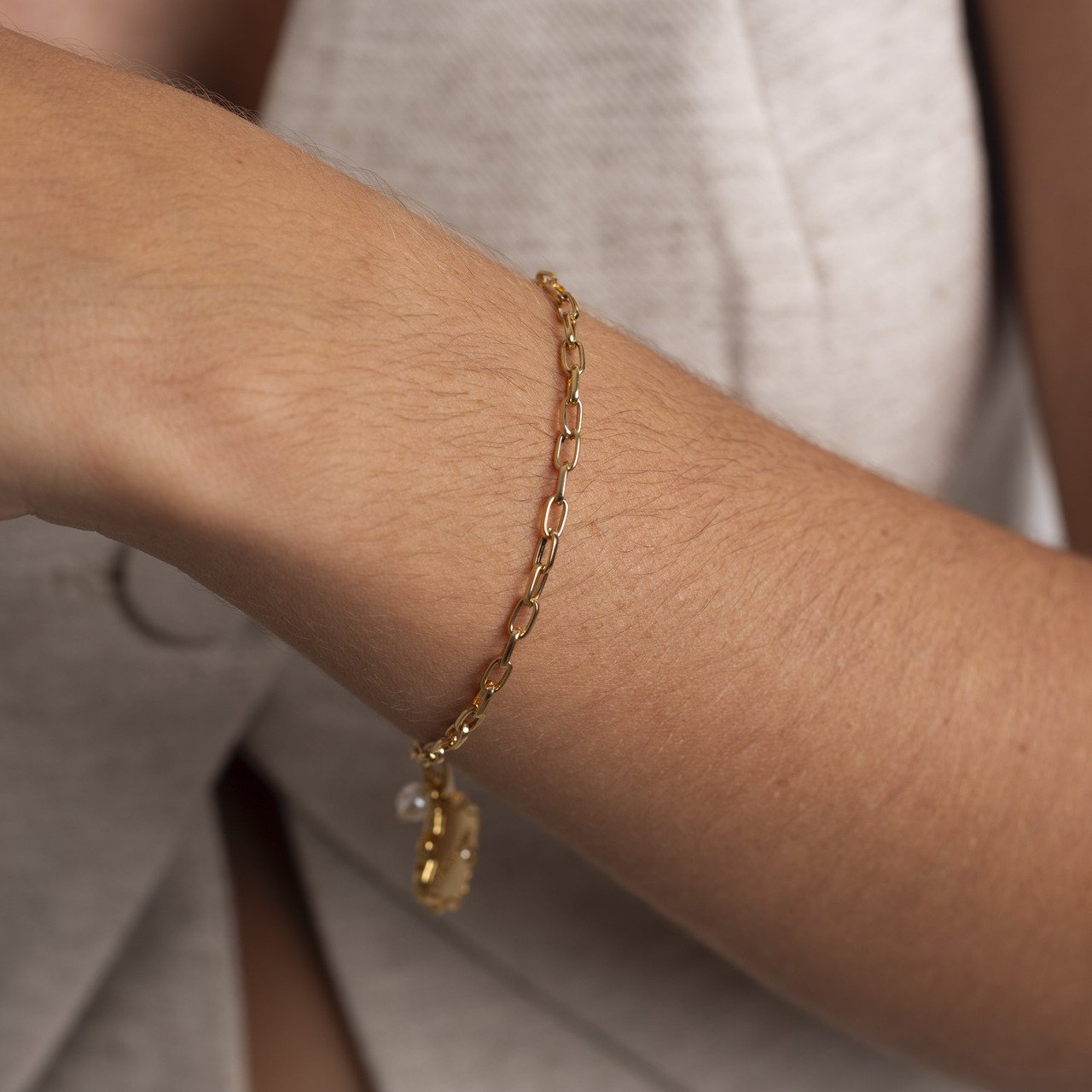 PULSEIRA PINGENTE BONDADE BANHO OURO