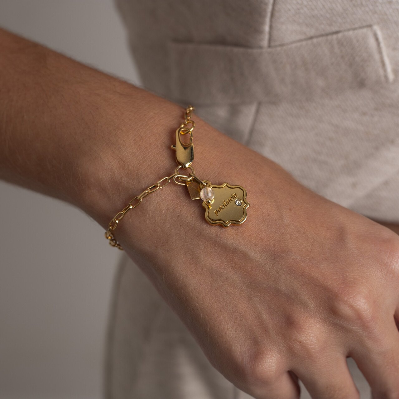 PULSEIRA PINGENTE PACIÊNCIA BANHO OURO