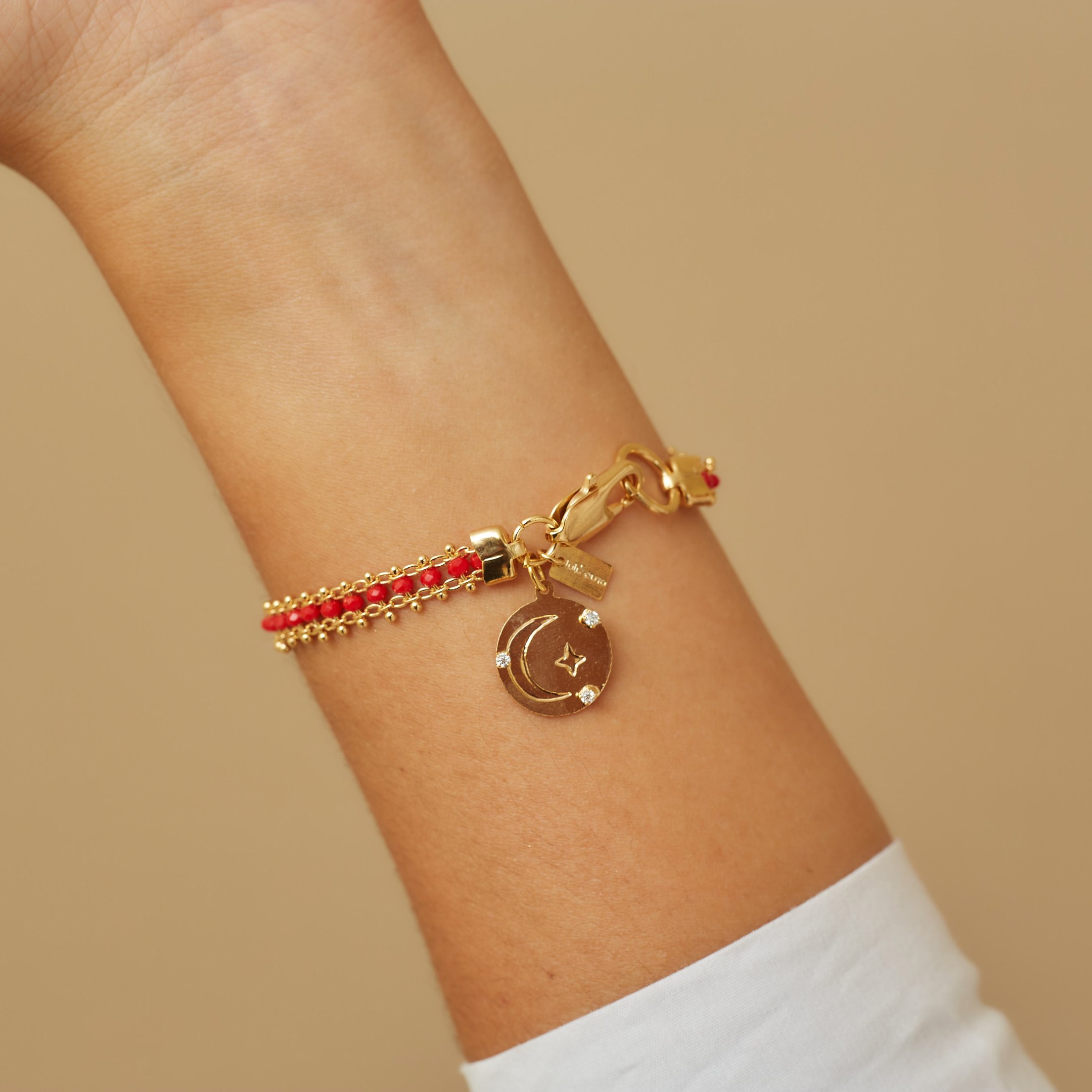 PULSEIRA PENEDO VERMELHA LUA BANHO OURO