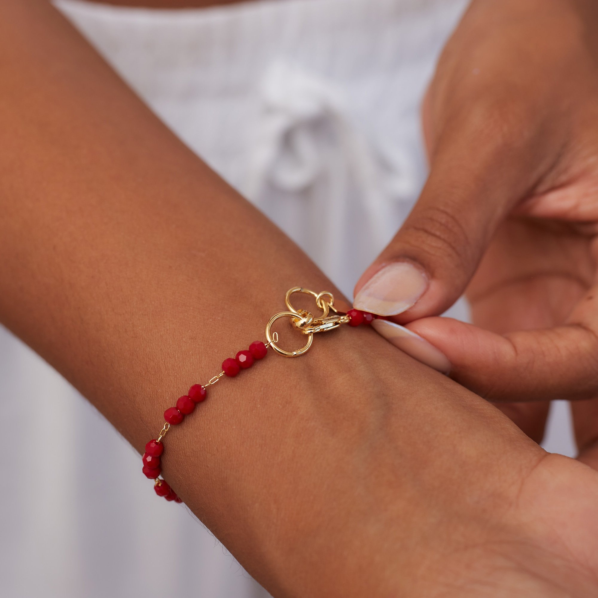 PULSEIRA AMOUR VERMELHO BANHO OURO
