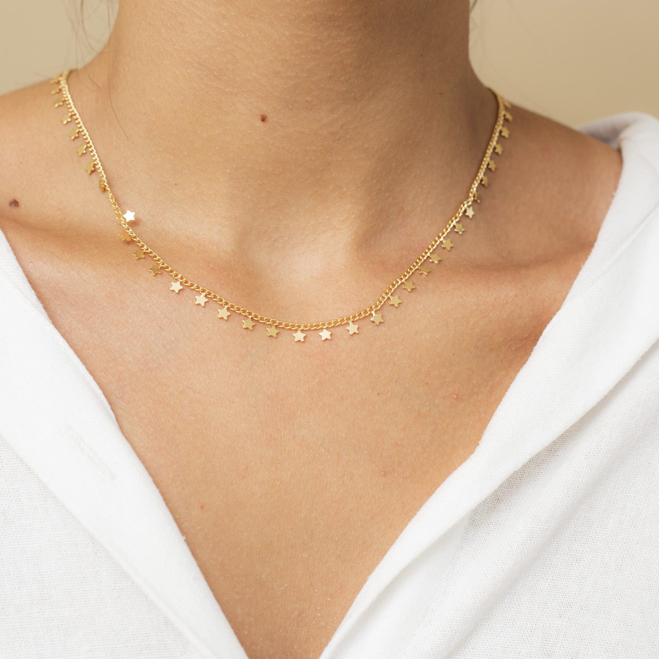CHOKER STAR PINGENTES ESTRELINHAS BANHO OURO