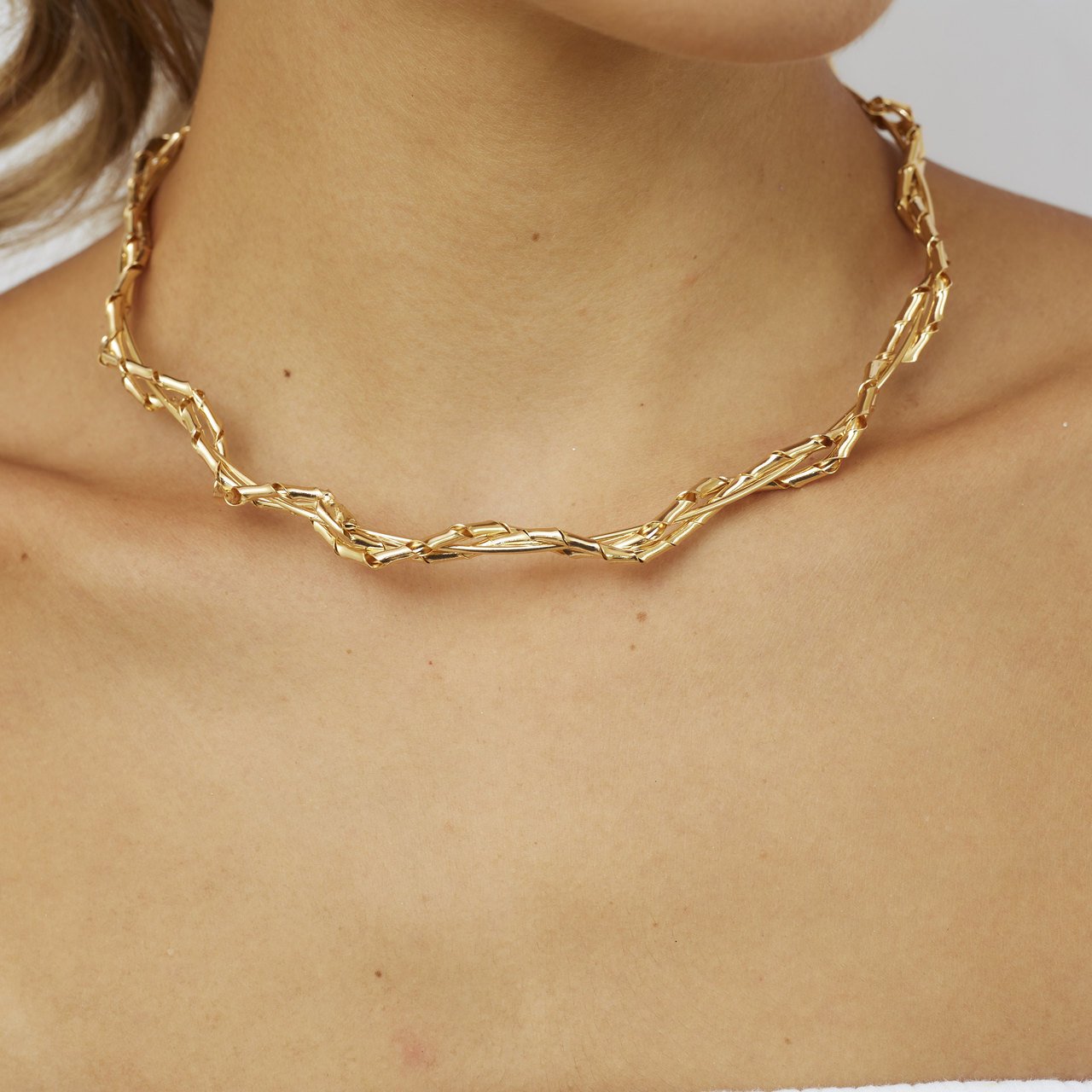 CHOKER ZOÉ ARO TRANÇADO DUPLO BANHO OURO