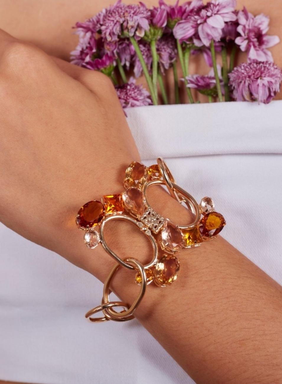 PULSEIRA CELESTE MIX CRISTAIS ARO OVAIS BANHO OURO