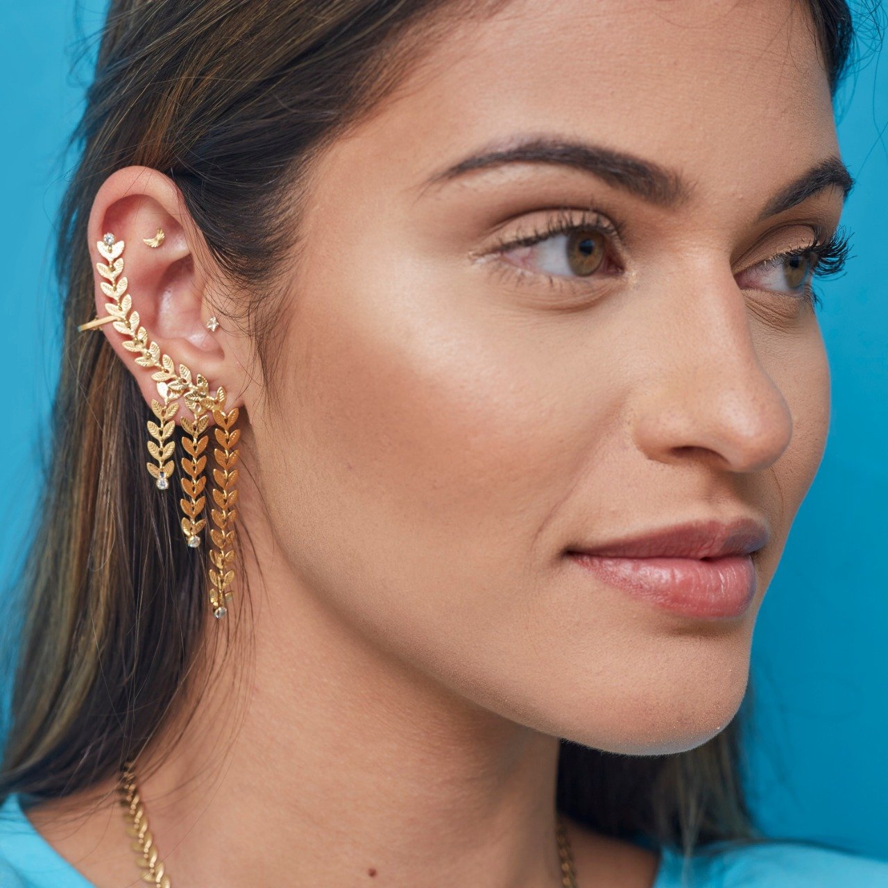BRINCOS HERA EAR CUFFS FOLHAS ZIRCÔNIAS BANHO OURO