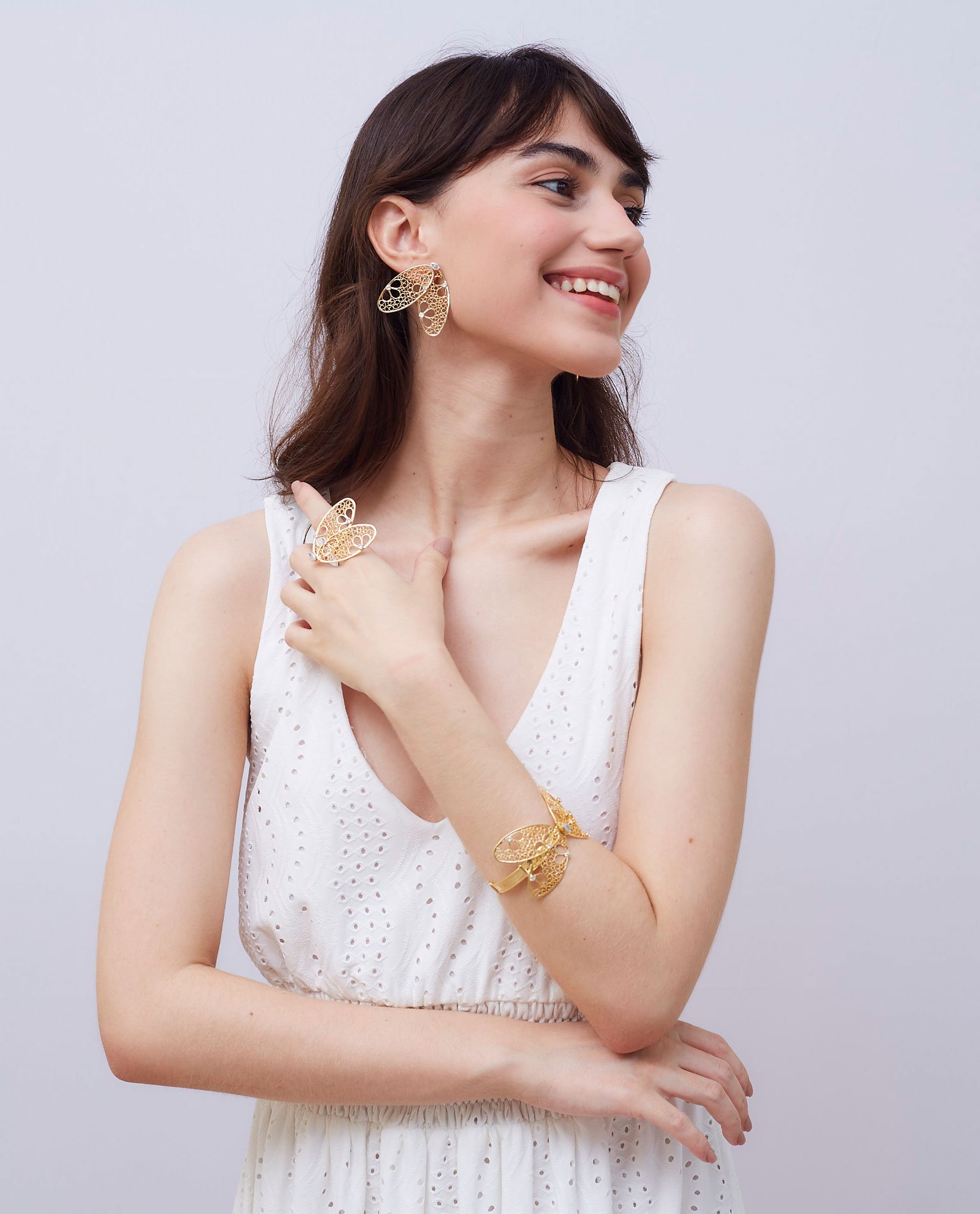 ANEL BORBOLETA CRAVAÇÃO CRISTAIS INCOLORES BANHO OURO