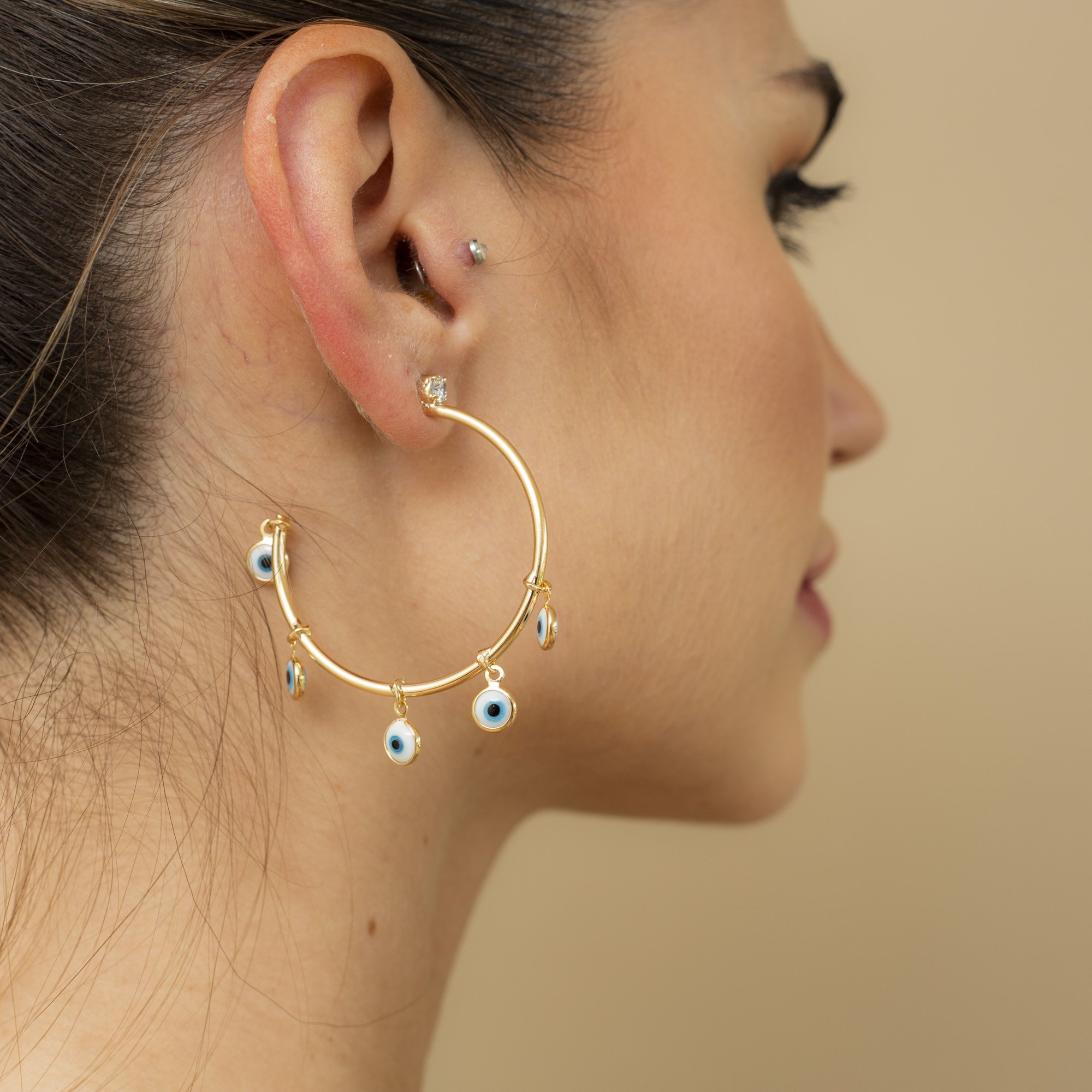 ARGOLAS PROTETOR M PINGENTES OLHO GREGO BANHO OURO