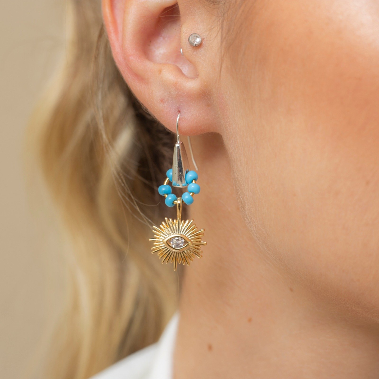 BRINCOS OLHO GREGO CRAVAÇÃO ZIRCÔNIA INCOLOR