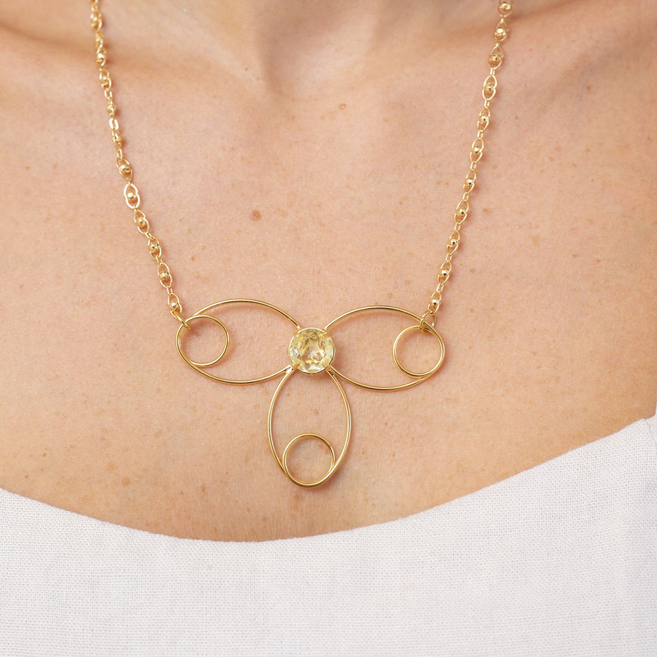 COLAR FRAN PINGENTE AROS OVAIS CRISTAL AMARELO BANHO OURO