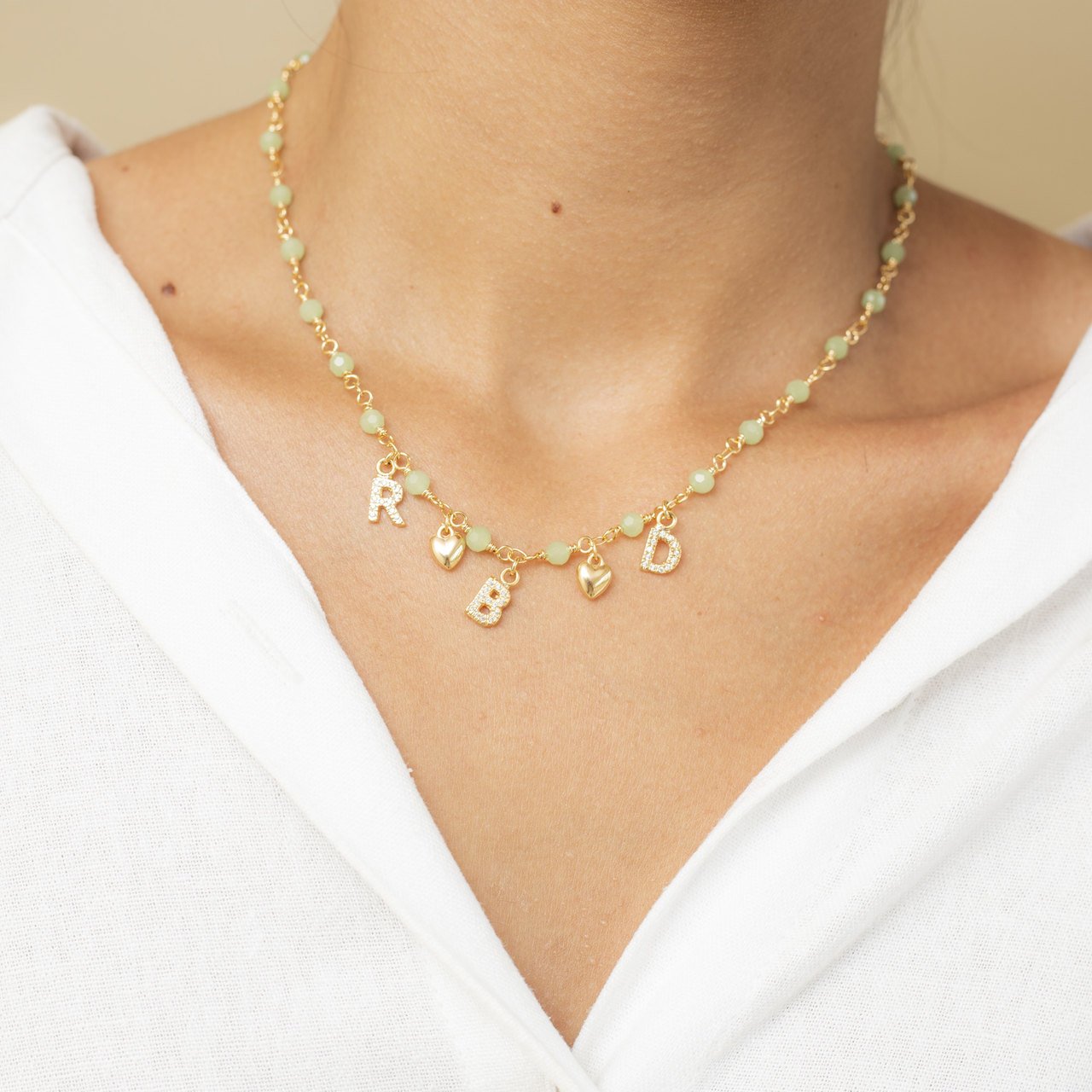 PINGENTE LETRAS CRAVAÇÃO ZIRCÔNIA BANHO OURO