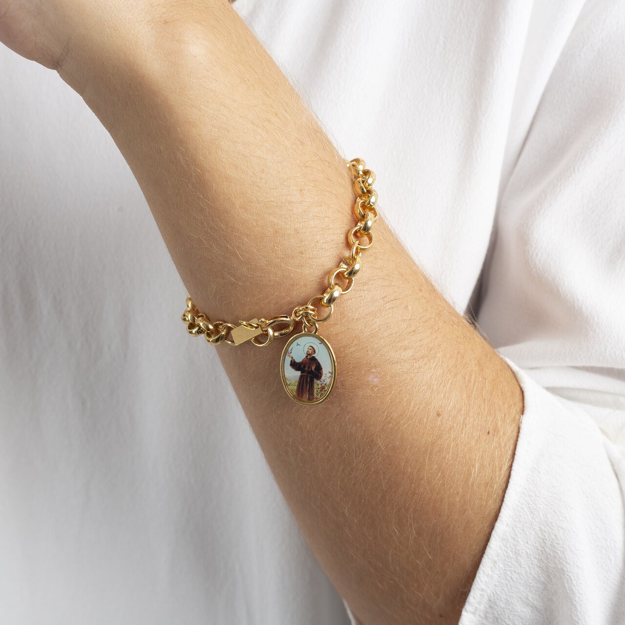 PULSEIRA ELOS SÃO FRANCISCO DE ASSIS BANHO OURO