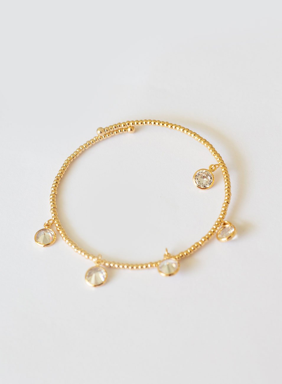 PULSEIRA PENDURICALHOS ZIRCÔNIA BANHO OURO