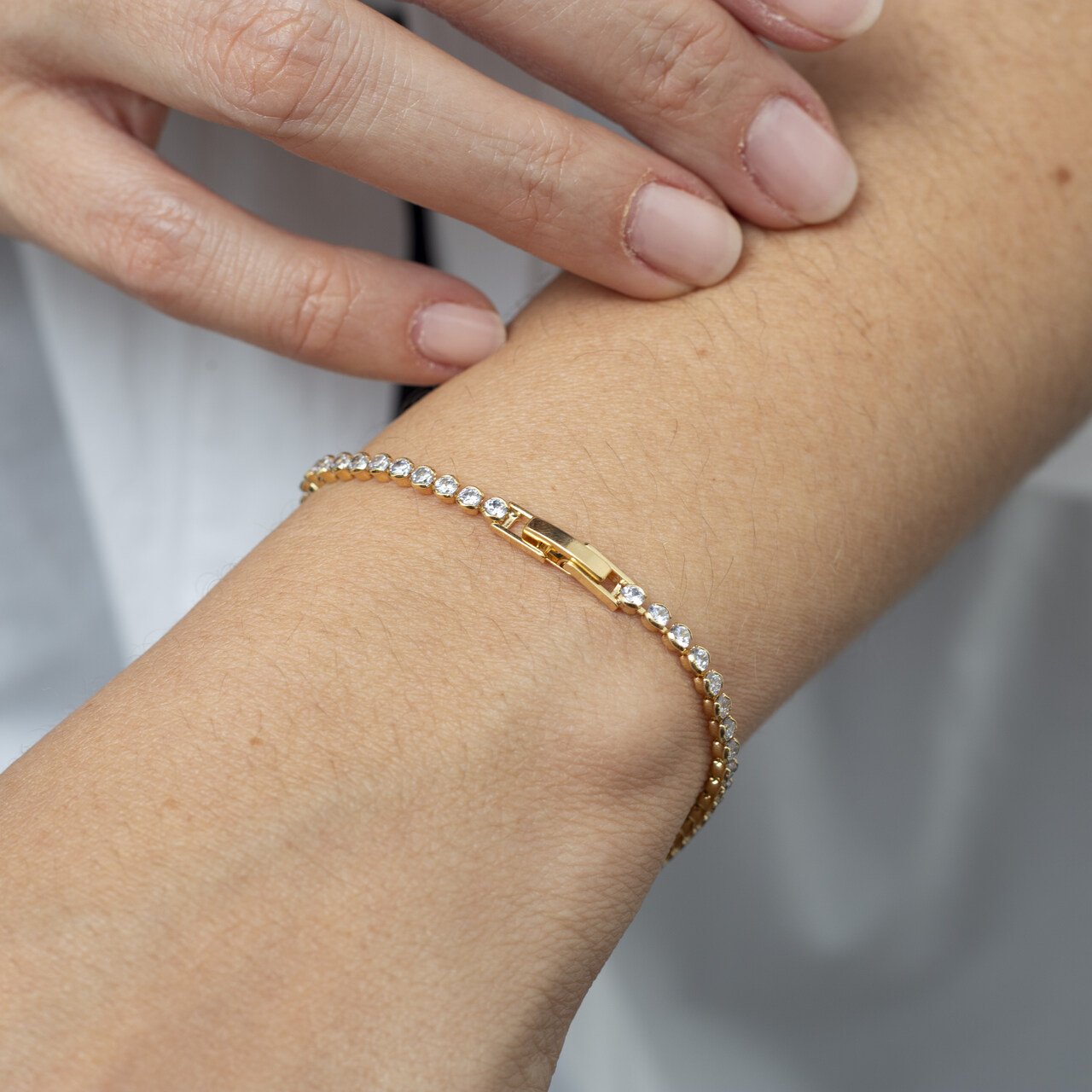 PULSEIRA RIVIERA CORAÇÃO ZIRCÔNIA BANHO OURO