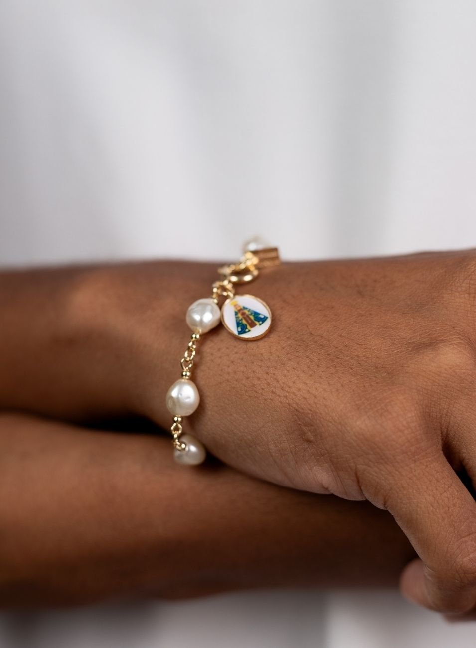 PULSEIRA SANTA ESMALTADO PÉROLA ARROZ B OURO